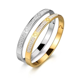 Bracelets en acier inoxydable poli or et argent avec trèfles et incrustations de cristaux