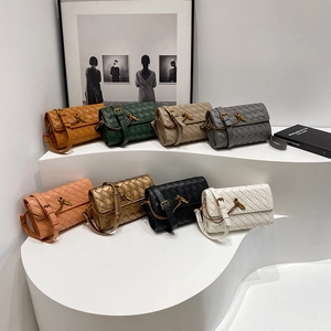 Handwoven leather crossbody bag collection with gold knot buckle in multiple colors