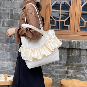 Minimalist white canvas tote bag with ruffled pleats for casual large capacity commute