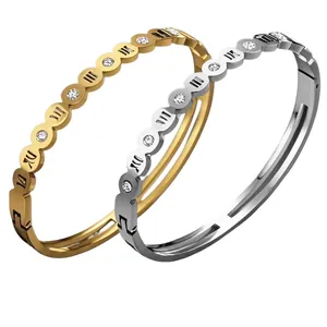 Stainless steel roman numeral bangle with pavé zircons in gold and silver finishes