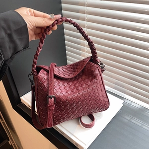 Handmade woven wine red handbag with crossbody strap and classic intrecciato texture