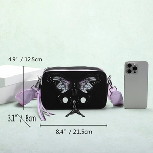 Retro butterfly camera bag in black and lavender with tassel detail and phone size reference