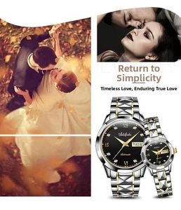 Macro detail of couple's automatic watches with two-tone steel bands and black dials