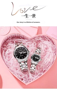 Close-up of couple watch set with automatic steel bands in heart-shaped gift box
