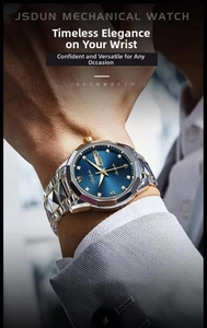 Macro shot of business quartz watch with blue sunray dial and gold steel strap
