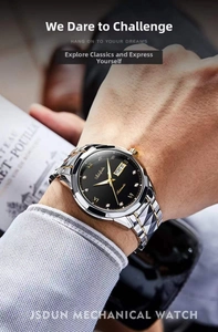Macro detail of quartz watch dial with dual calendar window and diamond markers