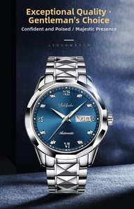 Macro shot of silver steel strap watch with dark blue sunray dial and day-date display