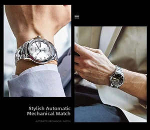 Macro view of automatic mechanical watch featuring a white Roman dial and steel strap