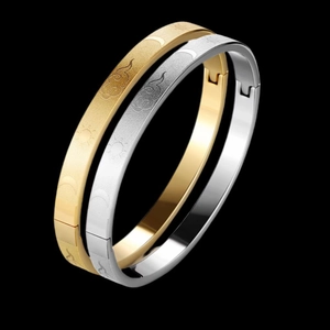 Polished stainless steel sun and moon open cuff bracelets in gold and silver finish