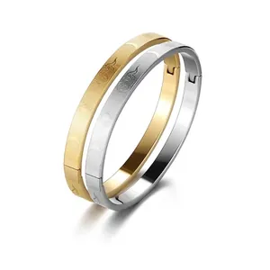 Polished stainless steel bracelets in gold and silver with celestial sun and moon engravings