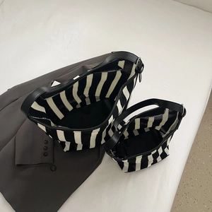Minimalist striped knit tote bag set in large and small sizes with black leather trim