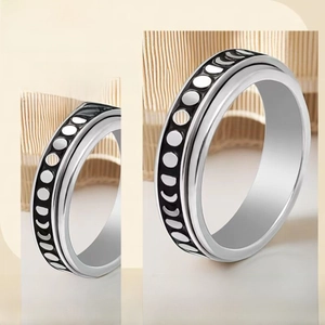 Detail of a rotating stainless steel stress relief ring with vacuum plating finish