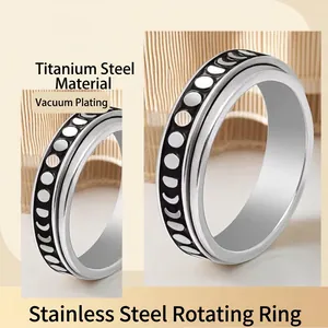 Titanium steel spinner ring with moon phase engraving and rotating black band design