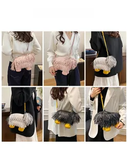 Detail shots of dog shaped crossbody bag with layered fringe and long straps in multiple colors
