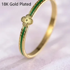 Polished 18K gold plated stainless steel clover bracelet with green enamel inlay for women