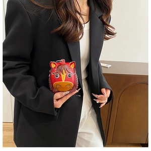 Miniature red horse-shaped leather coin purse with colorful patchwork and metal keychain