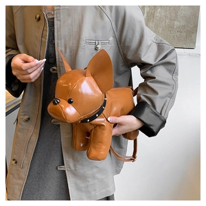 Detail of French Bulldog shaped PU leather crossbody bag with studded collar and cute ears