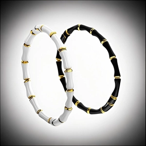 Elegant bamboo joint stainless steel bangles in black and white with gold accents