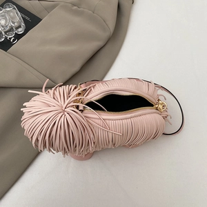 Creative pink fringe tassel crossbody bag with plush dog-style texture and gold zipper