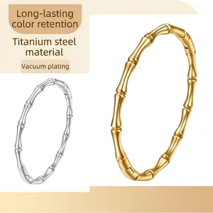Bamboo style 18K gold plated stainless steel open bangle with textured surface