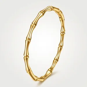 Polished 18K gold stainless steel bracelet featuring a minimalist bamboo node design