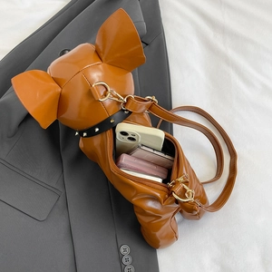 Quirky brown dog-shaped faux leather crossbody bag with gold stud collar detail