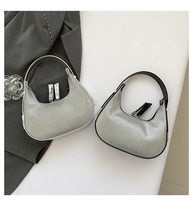 Detailed view of silver sequin hobo bags in all-silver and black-silver color variants