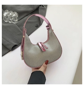 Silver rhinestone crescent moon bag with pink leather trim and dual zipper detail