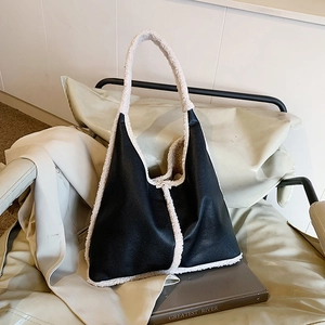 Retro large shoulder bag with black faux leather and white plush patchwork detail