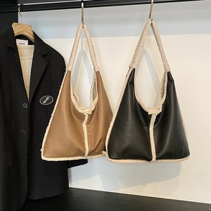 Brown and black faux leather tote bags with cozy shearling trim for autumn winter fashion