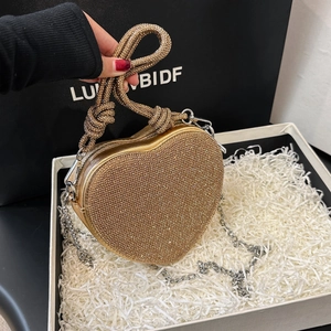 Sparkling gold heart rhinestone evening bag with knotted handle and chain strap for women