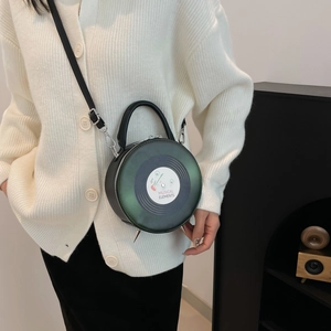Retro vinyl record shaped crossbody bag with green gradient and metallic studs