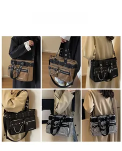 Détail d'un sac bandoulière en toile multi-poches avec œillets et chaînes métalliques