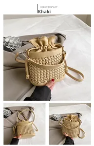 Detail view of khaki woven bucket bag featuring premium leather texture and drawstring liner