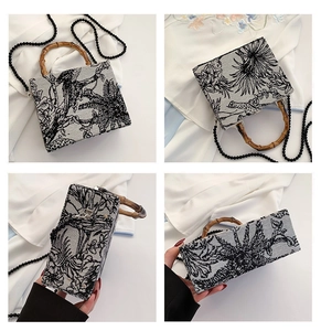 Detailed four-way view of embroidery handbag with bamboo handle and beaded strap