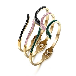 Chic snake-shaped stainless steel bracelets in black, pink and green with crystal pave