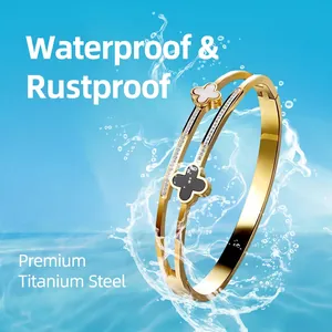 Waterproof gold titanium steel four-leaf clover bracelet with sparkling zircons