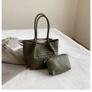 Detailed view of olive green woven tote bag set with matching inner zipper pouch