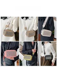 Detail of studded camera bags in six colors with stylish wide jacquard shoulder straps