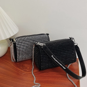 Sparkly rhinestone cylinder shoulder bag with chain strap and printed leather strap