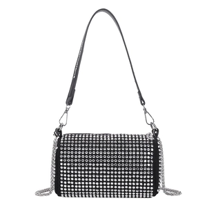 Sparkly rhinestone cylinder bag with leather shoulder strap and silver metal chain decoration
