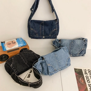 Retro washed denim shoulder bags with flap closure shown in four vintage colors