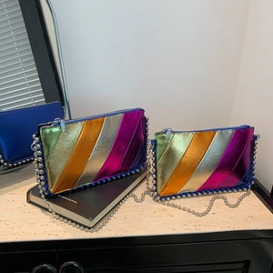 Metallic patchwork crossbody bag with purple and silver stripes and ball chain strap