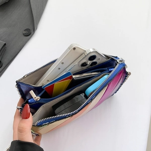 Colorful patchwork punk crossbody bag with multiple zip compartments and chain strap