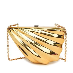 Elegant gold shell shaped acrylic crossbody bag with chain strap and crystal clasp