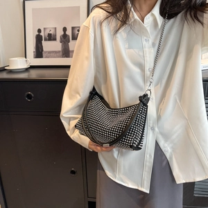 Sparkling black rhinestone underarm bag with silver chain strap and leather handle
