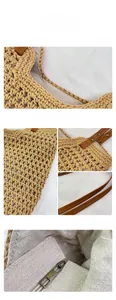 Detail of woven straw tote showing leather handles, metal rivets and interior lining