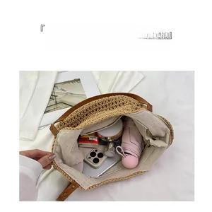 Top view of straw tote bag interior with linen lining showing large storage capacity