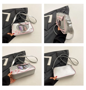 Silverita crossbody bag with heart-shaped window, pink bow trim, and four-angle views