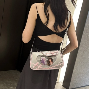 Silver Ita-bag with pink bow and heart clear window showing anime character cards